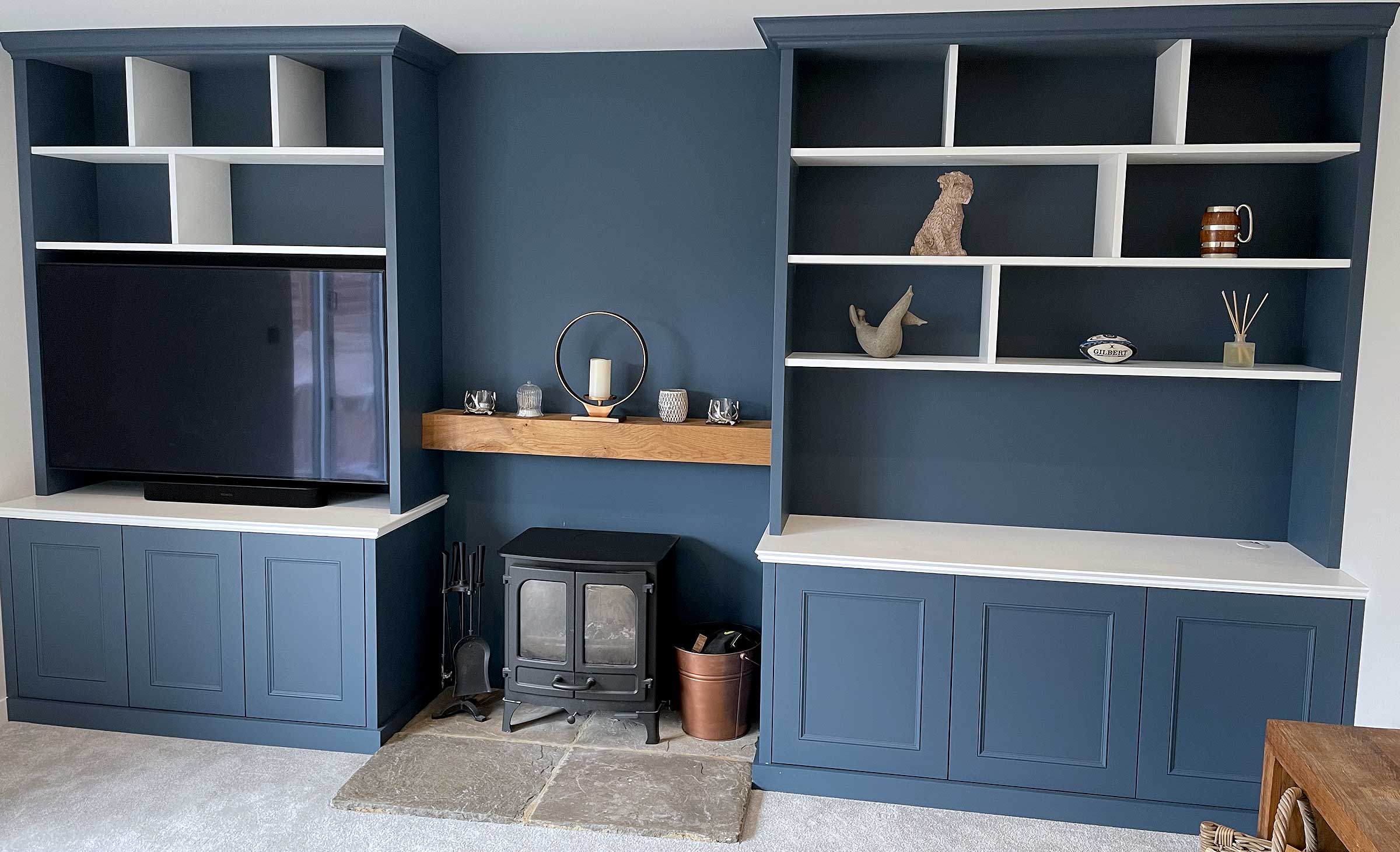 bespoke_hand-built_dark_blue_inbuilt_living_room_shelving_cupboards_and_storage.jpg